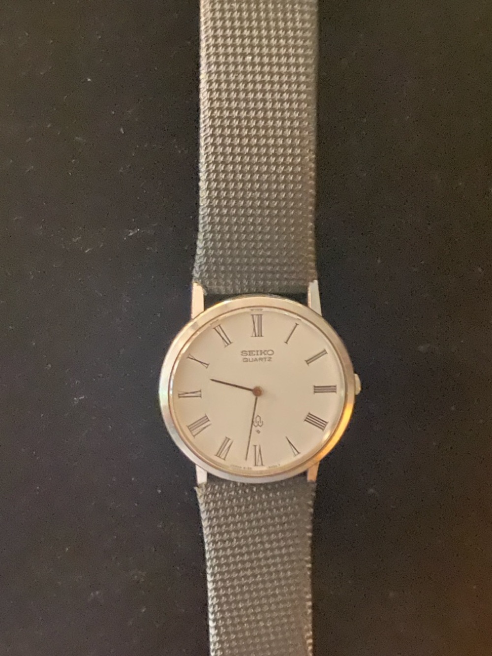 Vintage Seiko Men's Silver Dress Watch with White Dial